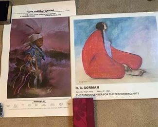 Includes (2) poster prints, (1) R.C. Gorman, "Barcelona Rose" in original wrapping, H 25"x W 22" and (1) Native American Survival print from 1992 Annual Heritage Week, H 33"x W 22".