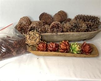 Includes (1) large carved wooden bread bowl with very large pine cones inside, H 5"x W 34"x D 15", (1) smaller carved wooden bread bowl with dried artichokes, H 3"x W 22"x D 7" and (1) large bag filled with decorative potpourri. All are in used condition.
