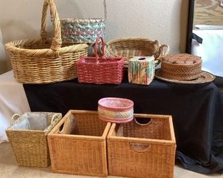 Approximately (12) woven basket of different colors, shapes and sizes, including (1) extremely large handled basket.