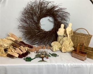 Includes (1) wooden limb wreath, H 30" x W 30", (3) woven baskets, largest is H 12"x W 13"x D 7", several dried ears of corn in different sizes and colors, (5) decorative clay birds, (2) straw turkeys, (2) 16" straw people and outdoor metal decorations. Some corn has kernels and husk missing as well as hot glued areas. All are considered used.