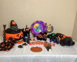 Includes (1) stuffed Jack-O-Lantern, H 17"x W 13"x D 5", stuffed black cats of various sizes, (1) 14" candy bowl and more! All are considered used.