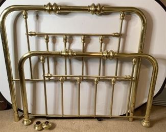 Brass colored metal headboard, H 50"x W 55" and footboard, H 34"x W 55" pieces, some scratches and scuffs on metal, no side rails.