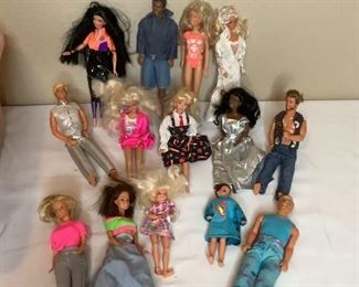 Includes a full tote of various Barbie and Ken dolls, all are used condition.