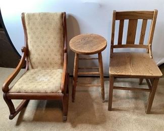 Includes (1) old fashioned wood rocking chair with cream and pink floral fabric, hole in fabric on back and worn areas throughout, seat cushion is not attached,H 31"x W 20"x D 27", (1) wooden bar stool, shows repair under seat, H 24"x W 13" and (1) wooden side chair, H 32"x W 16"x D 16.5". All wood on items have scratches, wear marks, scuffs and nicks.