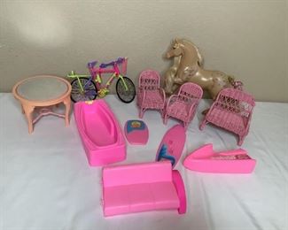 Includes Jet ski, bike, horse, bathtub, chairs and more! Items may not be Barbie brand and are in used condition.