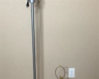 Includes (1) silver colored metal floor lamp with (5) bulbs posable strands, H 62"x W 10" and (1) blue ceramic table lamp, H 24"x W 11", no lamp shades or bulbs, unknown working condition.
