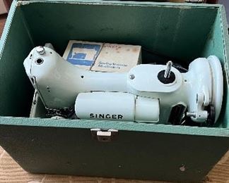 Another rare Singer 1960’s portable sewing machine with case.