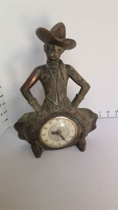 Vintage metal cowboy clock 11" tall