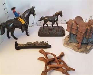 2 metal horse statues, railroad nail decor and saddle decor