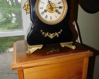 clock and shoe-shine stand 