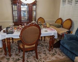 China cabinet and dining table with chairs