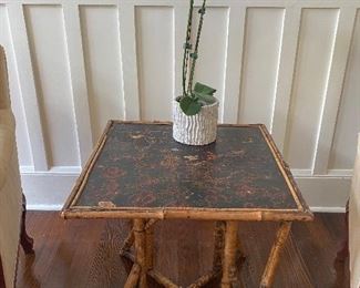 Sought over bamboo side table 