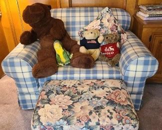 Plaid cloth over sized chair
Flowered ottoman