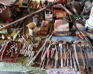 Wide assortment of tools, rachets, sockets, screwdrivers, tap & die sets