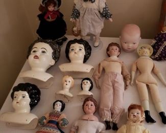 Porcelain dolls and doll parts 