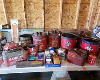 Large assortment of vintage gas, oil cans, car parts, etc