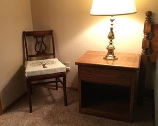 Side Chair with, nightstand and brass lamp