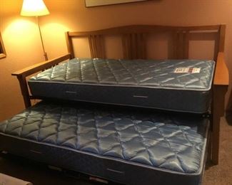 Trundle Day Bed with 2 Sealy mattresses. Bed frame measures 83in W x 41.5in D x 41in H 