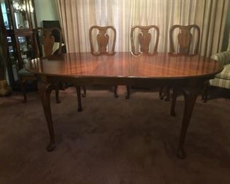 Dining table shown with one leaf measures  72.25in L x 42in W x 29.5in H. (Each leaf measures 12in x 42in)