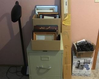 File Cabinet, Picture Frames, Telephone, Projector Screen, Floor Lamp.