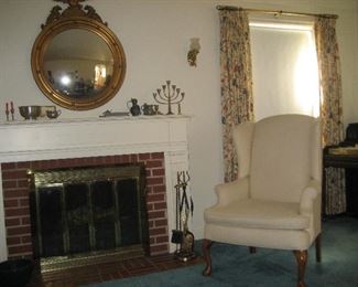 Federal convex mirror, fireplace set, upholstered wing back chair, upright piano