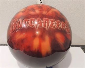Tampa Bay Buccaneers bowling ball. Holes are not drilled out so it can be drilled to your finger size, or not