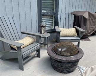Two poly wood resin outdoor Adirondack chairs.  Grand inroad fire pit . ( on top screen.)