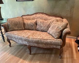 Late 20th Century vintage Ethan Allen Jackckard Damask sofa. With wooden scallop back and trim. 69 x 35 x 38