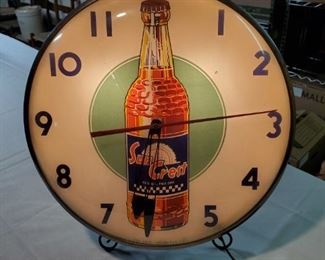 Vintage Suncrest advertising clock...single break through the face, intact and working !