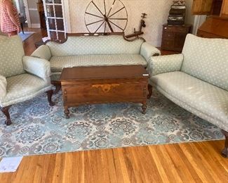 Two and three piece formal upholstered living room set.
Rug?