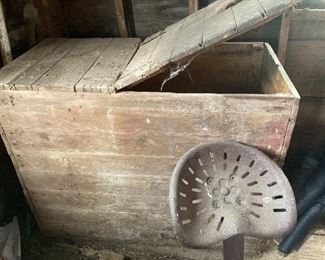 Grain bin, wooden boxes, antique tools, wagon seats