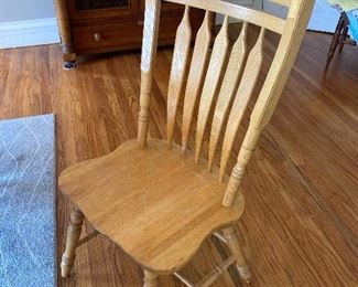 4  solid wood oak chairs. Can be easily re-stained using easy off oven cleaner, copper scrubbing  pad, and stain as I did to the once -matching table. 