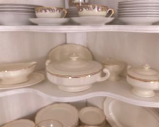 Top Czechoslovakian China is no longer available. See gold- trimmed china on bottom  two shelves.