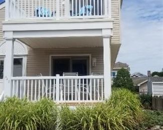 Vinyl railing; plants and interesting rocks and gravel