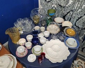 Lots of teacups and pretty glassware