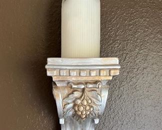 A pair of candle sconces