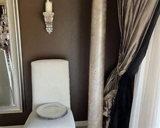 Decorative column and one of the dining chairs