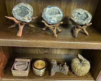 Geodes with rustic/primitive wood stands. 