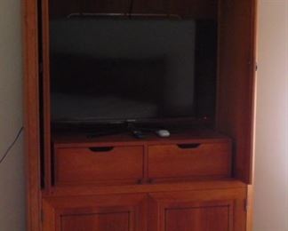 Stickley maple armoire with TV (sold separately)