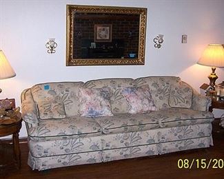 Sofa, end tables, wall mirror