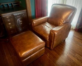 First brown leather chair and ottoman