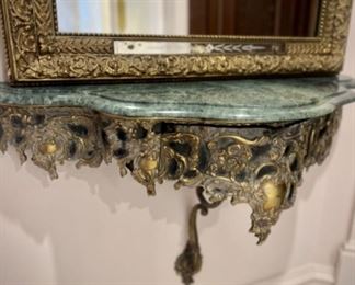 Marble-topped wall shelf with hidden drawer