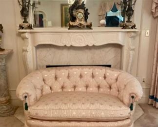 Pale blush pink sofa with pleated skirt