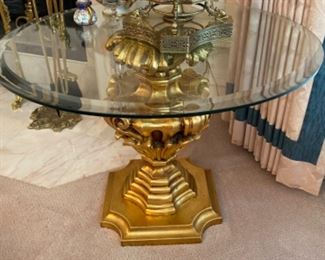Glass-topped gold side table