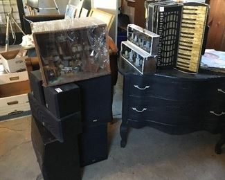 Speakers, accordian, dresser