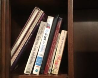 Books in entertainment center in living room