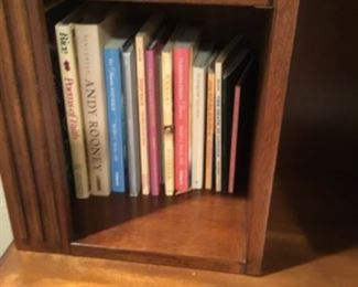 Books in entertainment center in living room