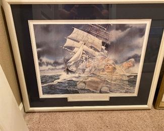 Lots of framed, under glass, pictures