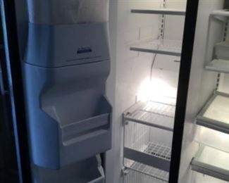 Whirlpool side by side refrigerator freezer- Garage
