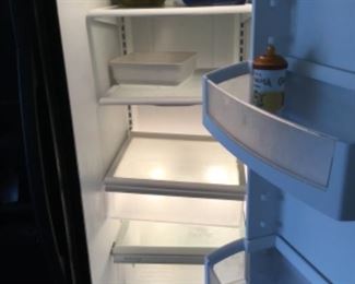 Whirlpool side by side refrigerator freezer- Garage